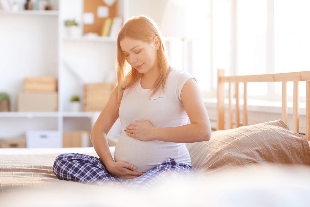 Pregnant Woman in Sunlight