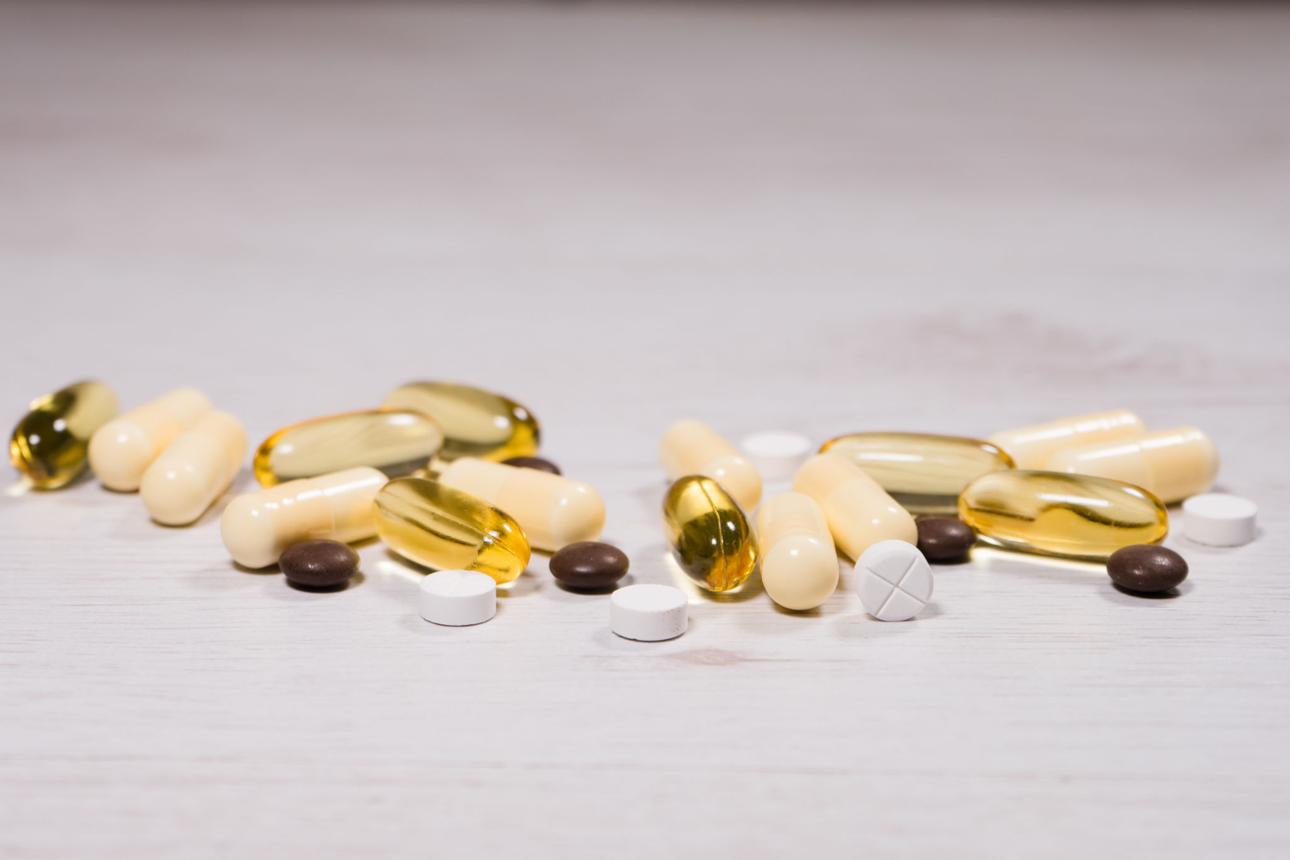 Pills capsules and tablets medicine drugs on the table